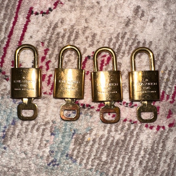 Authentic Louis Vuitton Shiny Gold Lock